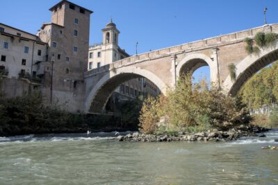 The ancient Ponte Fabricius and the Tiburtine island in Rome